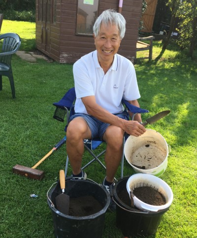 Mike Chan sifting soil